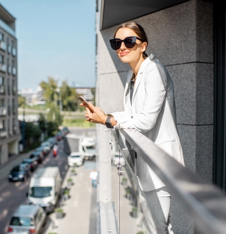 woman-on-the-balcony-of-the-modern-residential-are-2021-12-09-04-28-48-utc